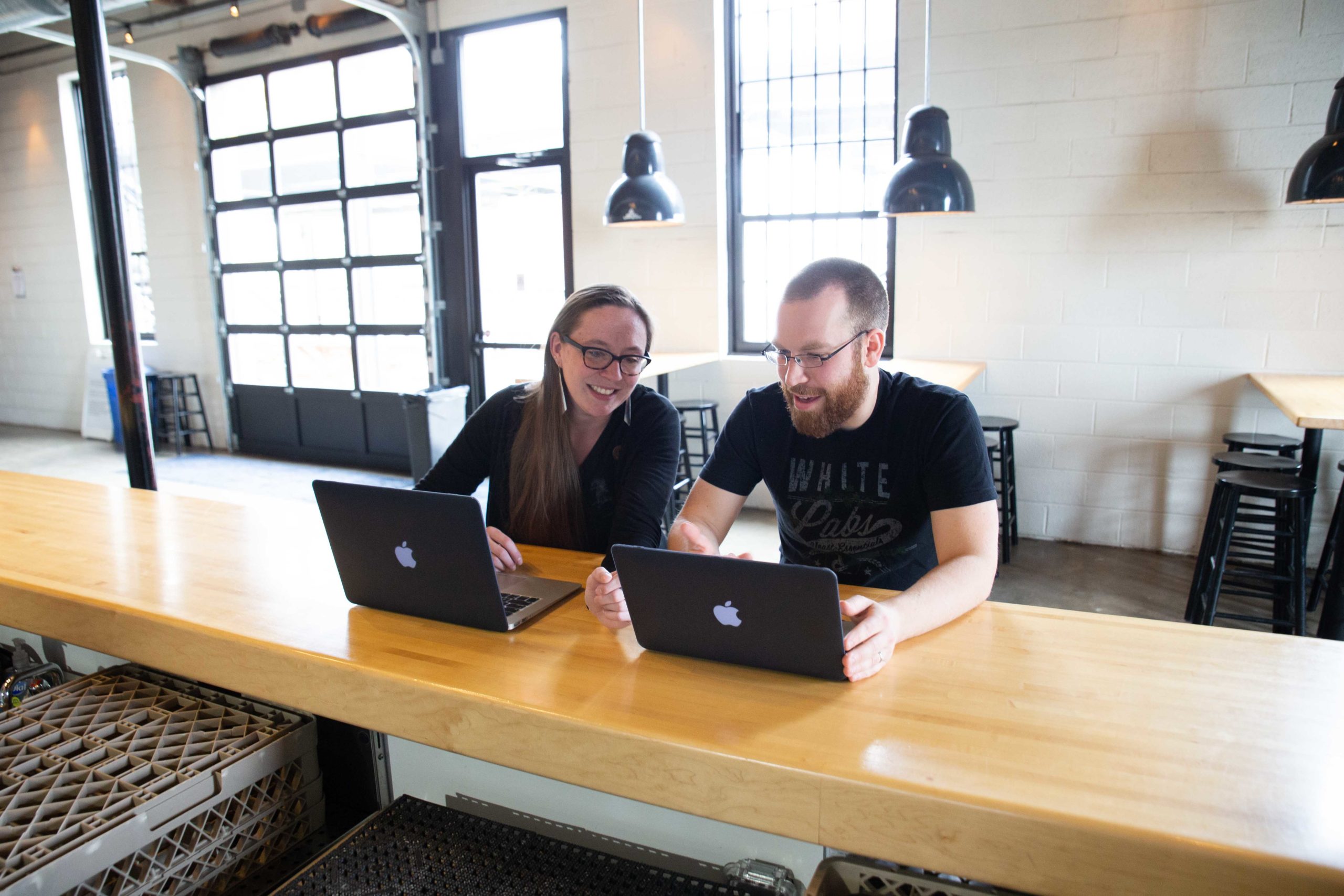 brewery employees using computers