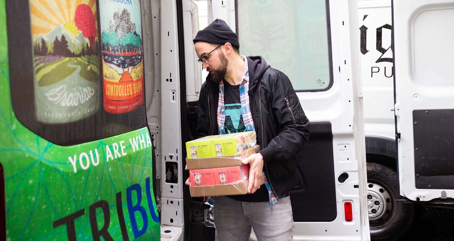 brewery employee loading a van