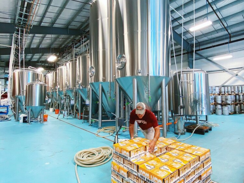 a worker at 603 brewery