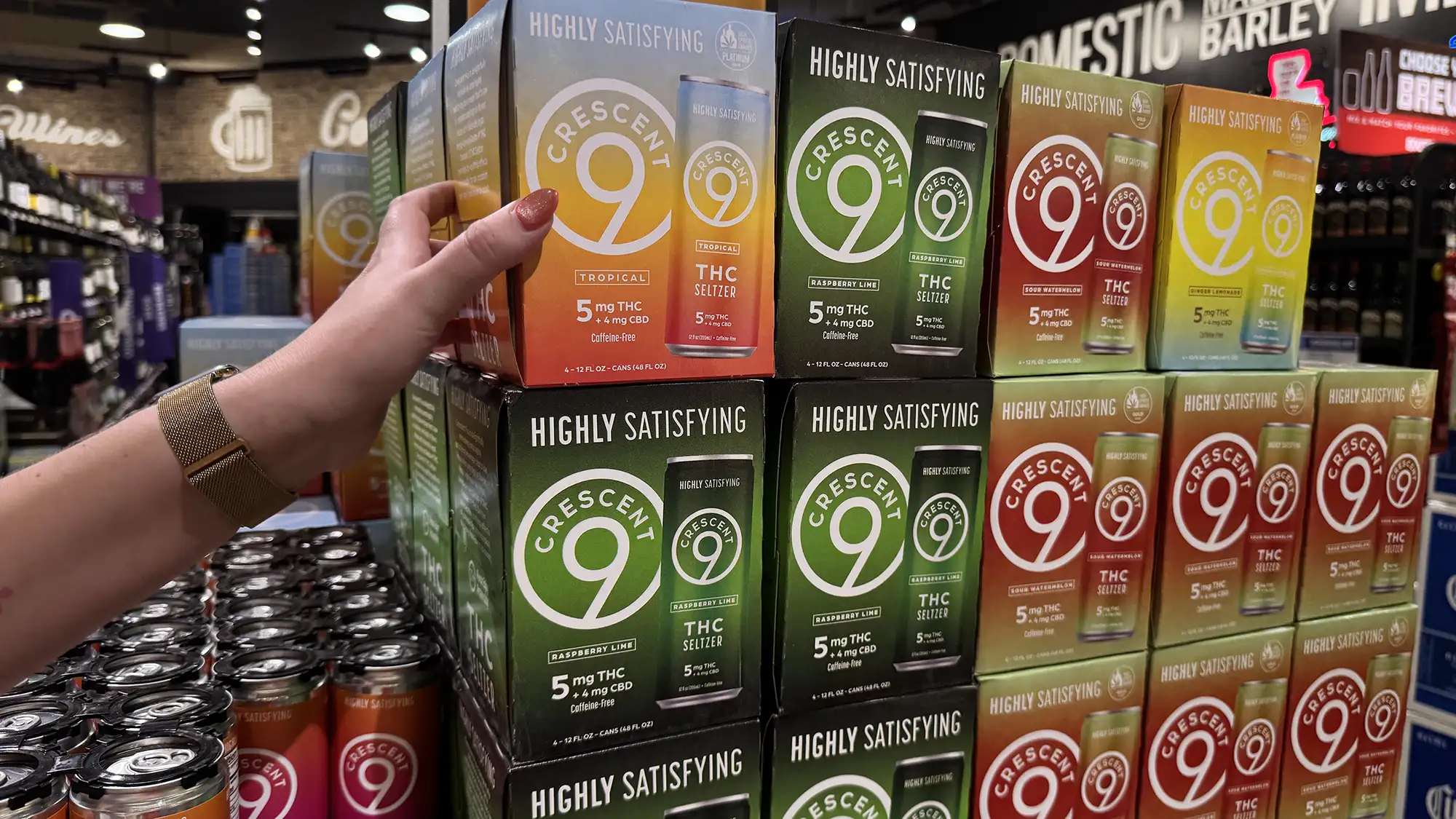 Boxes of Crescent Canna THC seltzers in a retail store